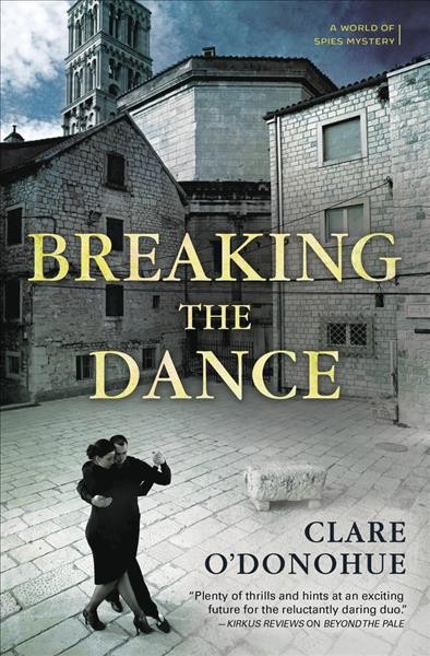 Breaking the dance : a world of spies mystery / by Clare O'Donohue.