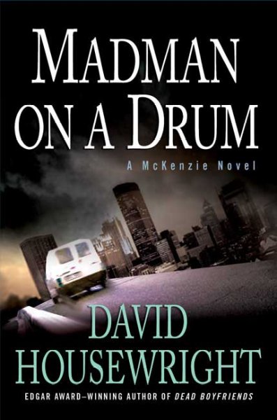 Madman on a drum / David Housewright.